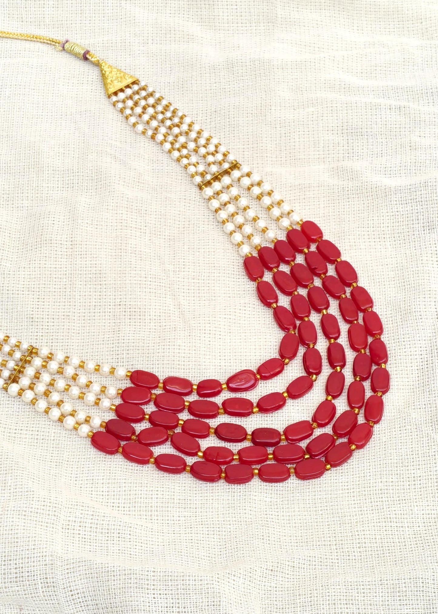 MULTI LAYRED NECKLACE WITH PEARLS AND RED RUBYS